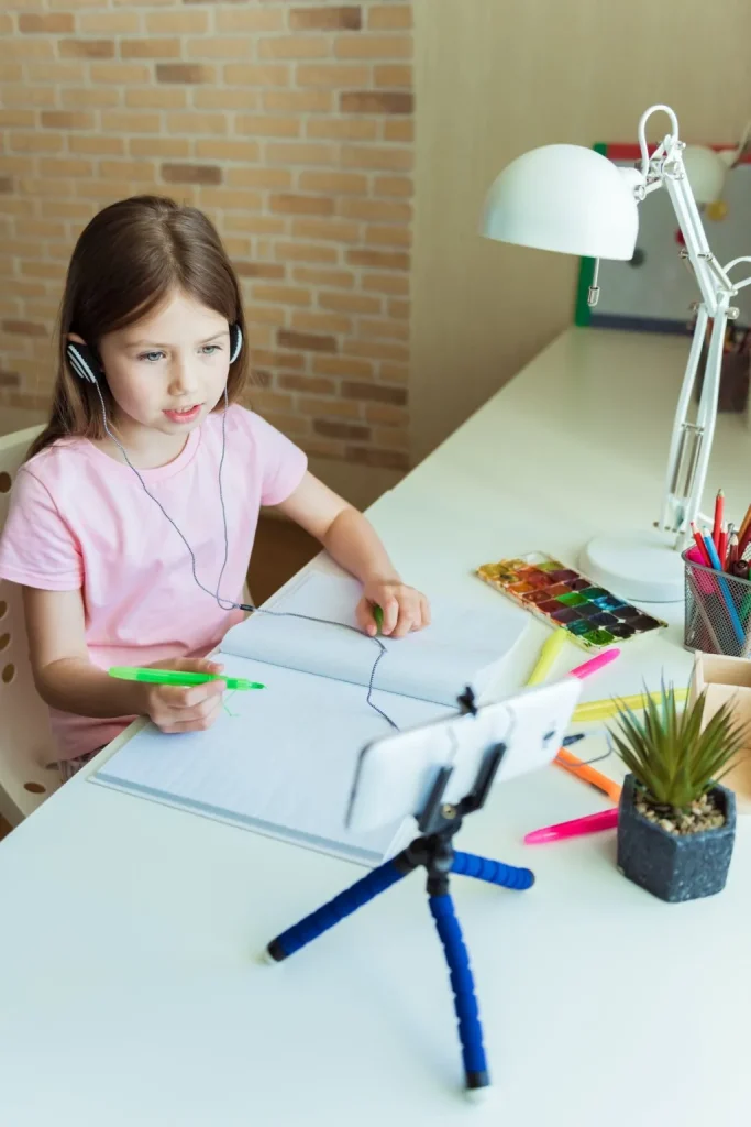 little girl painting with color pencils home 1025x1536 1